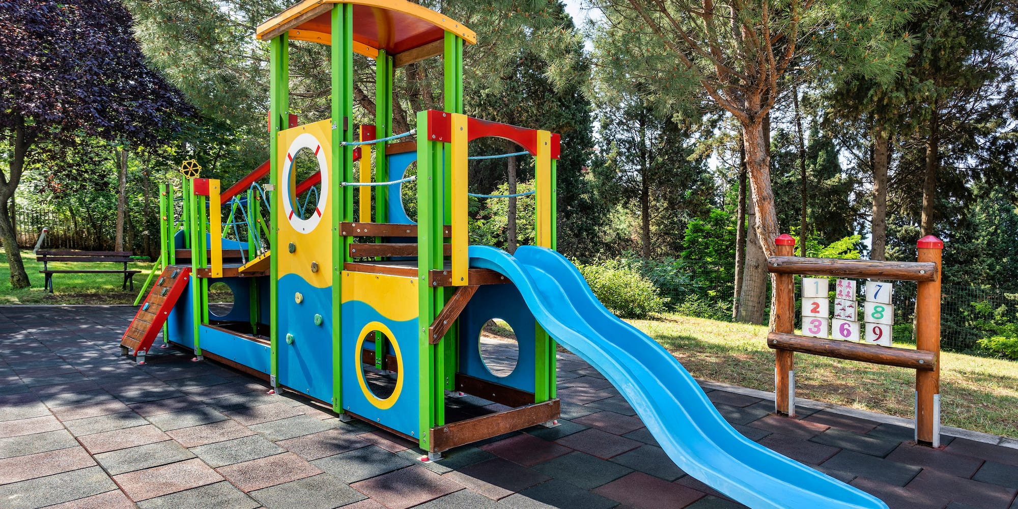 a colorful playground with a slide