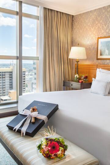 a gift box on a bed