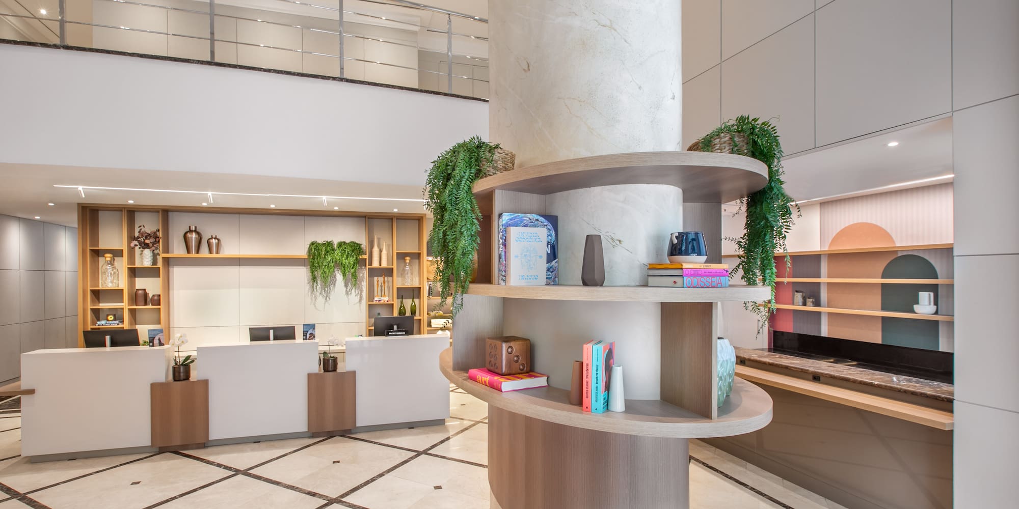 a large white column with shelves and plants on it