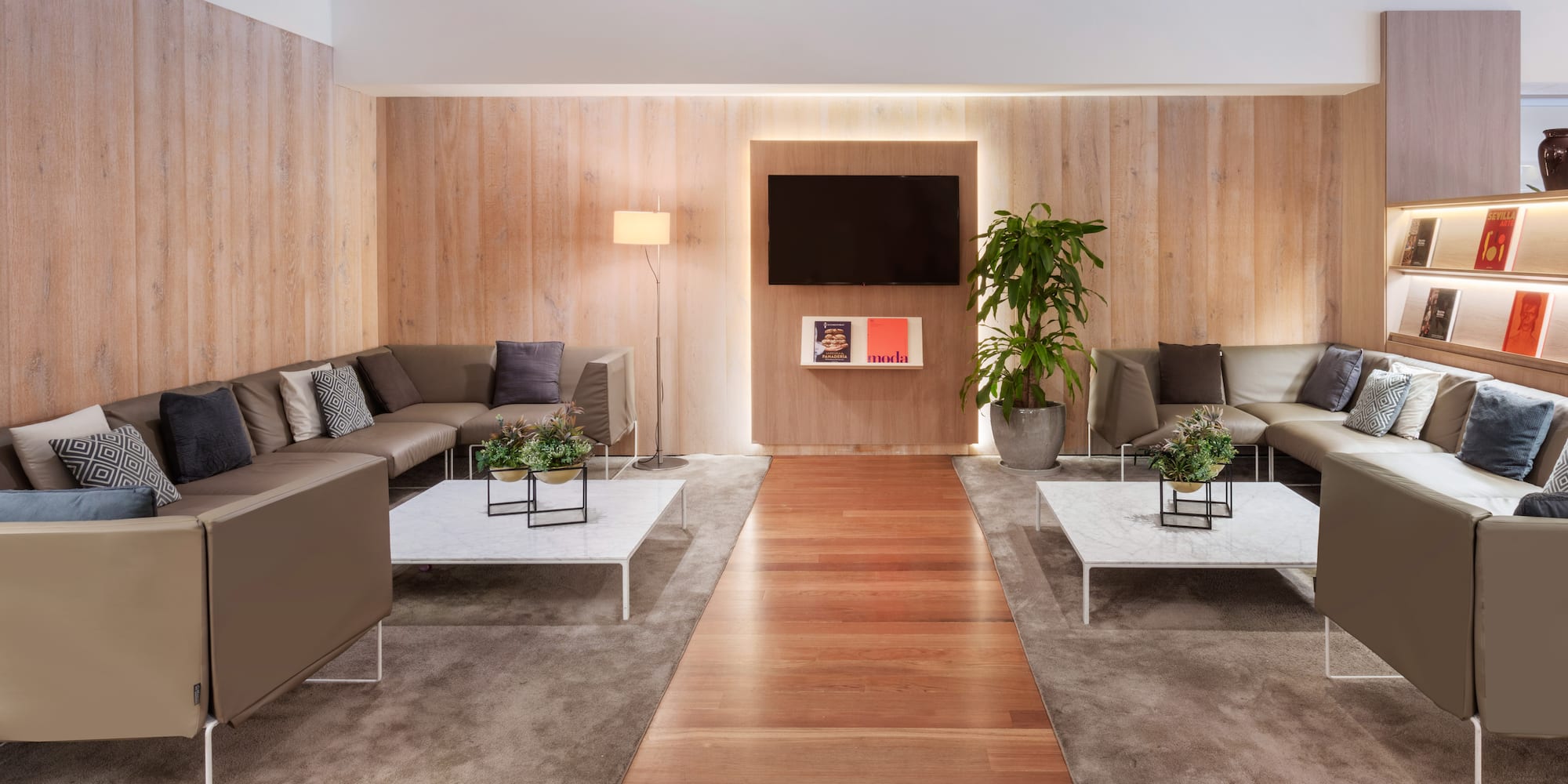 a room with couches and tables