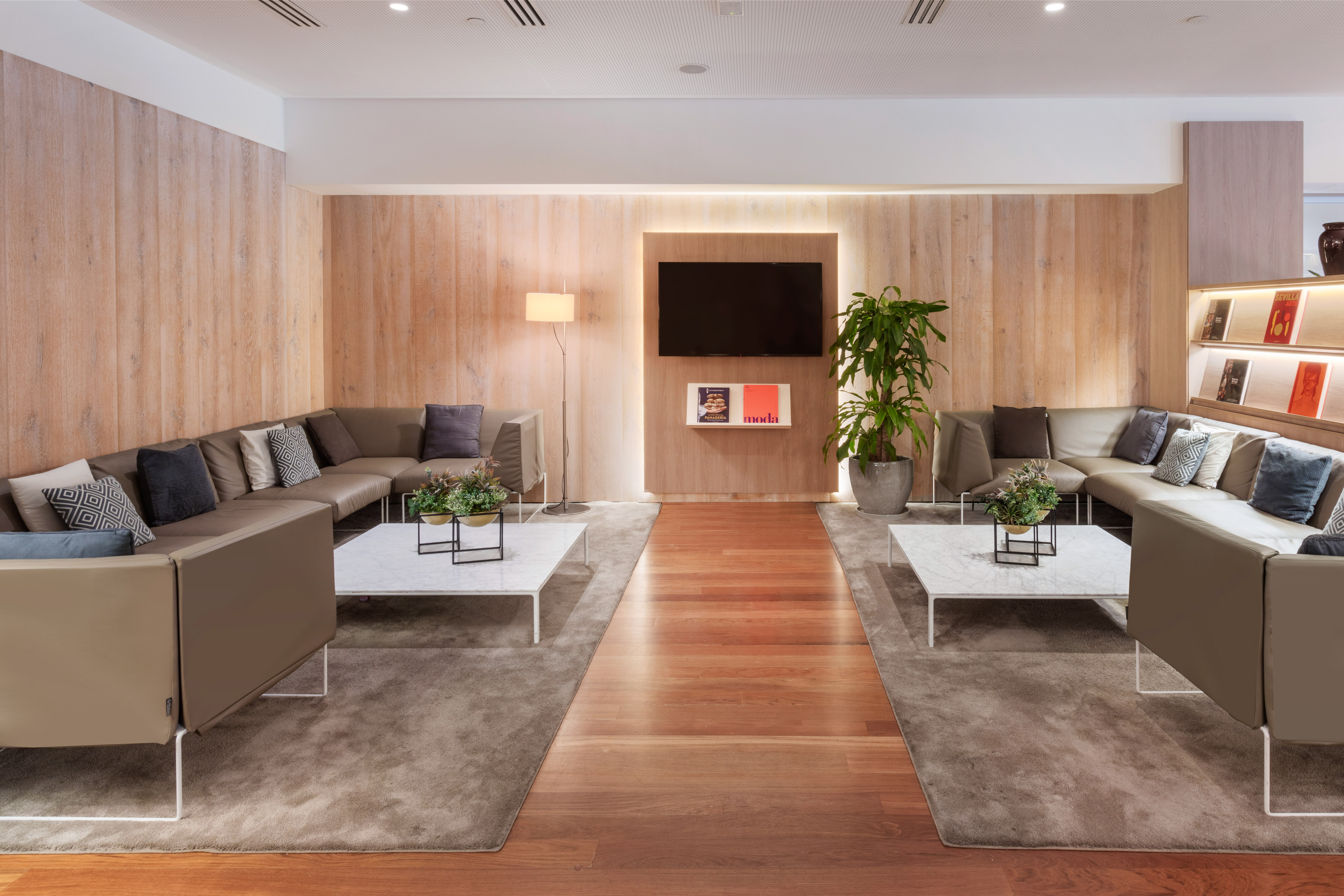 a room with couches and tables