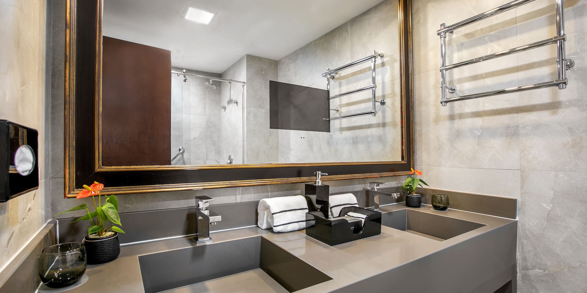 a bathroom with a mirror and sink