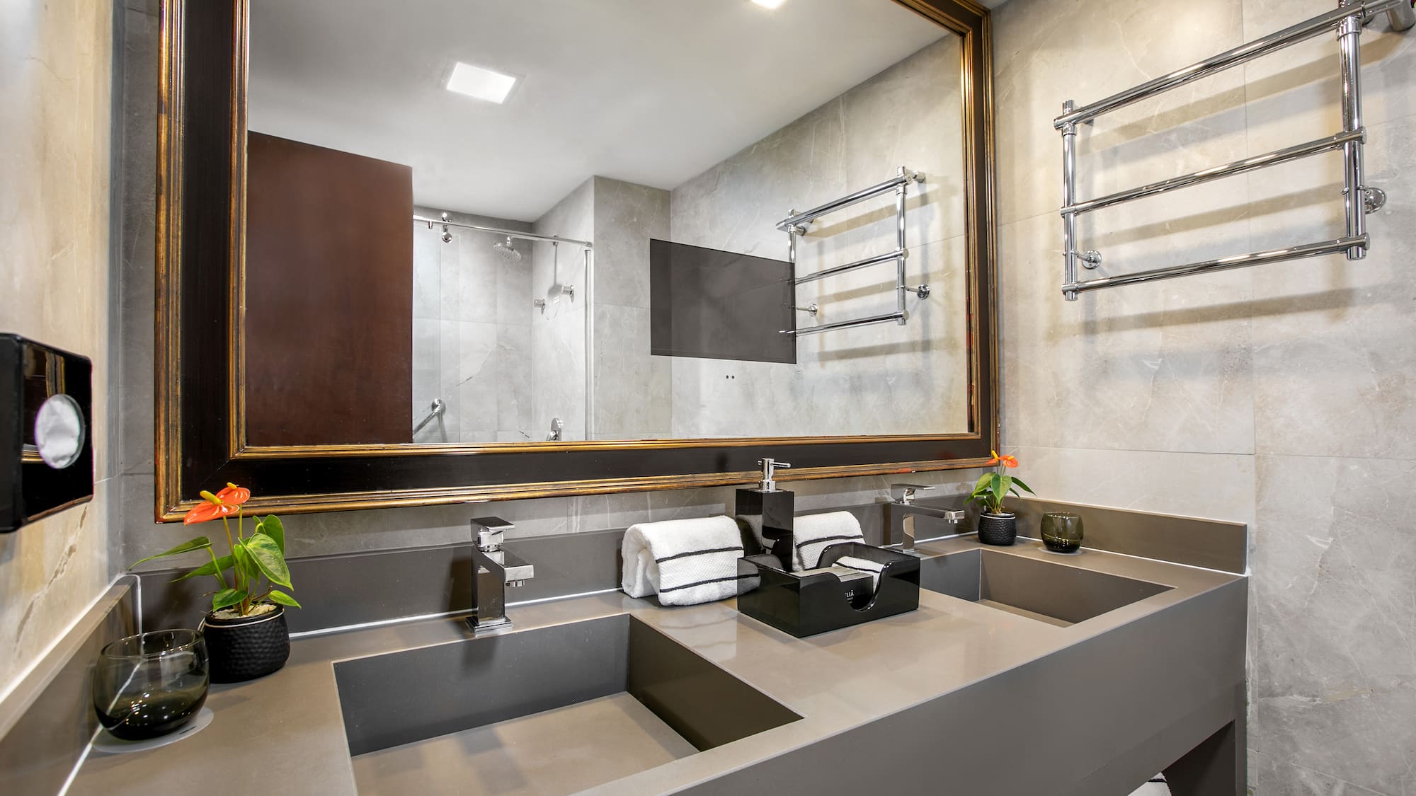 a bathroom with a mirror and sink