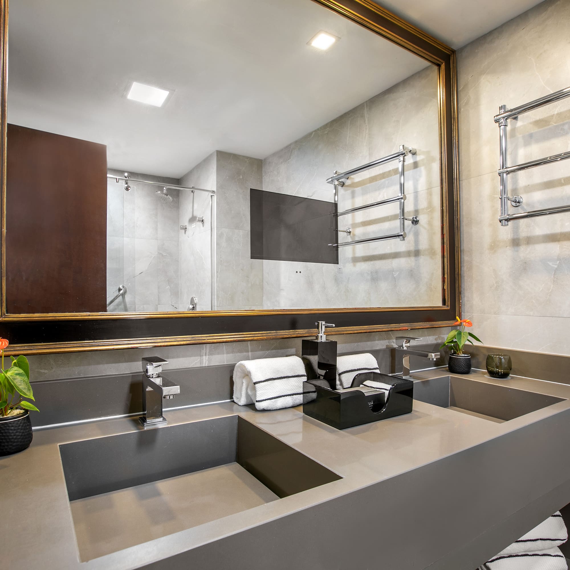 a bathroom with a mirror and sink