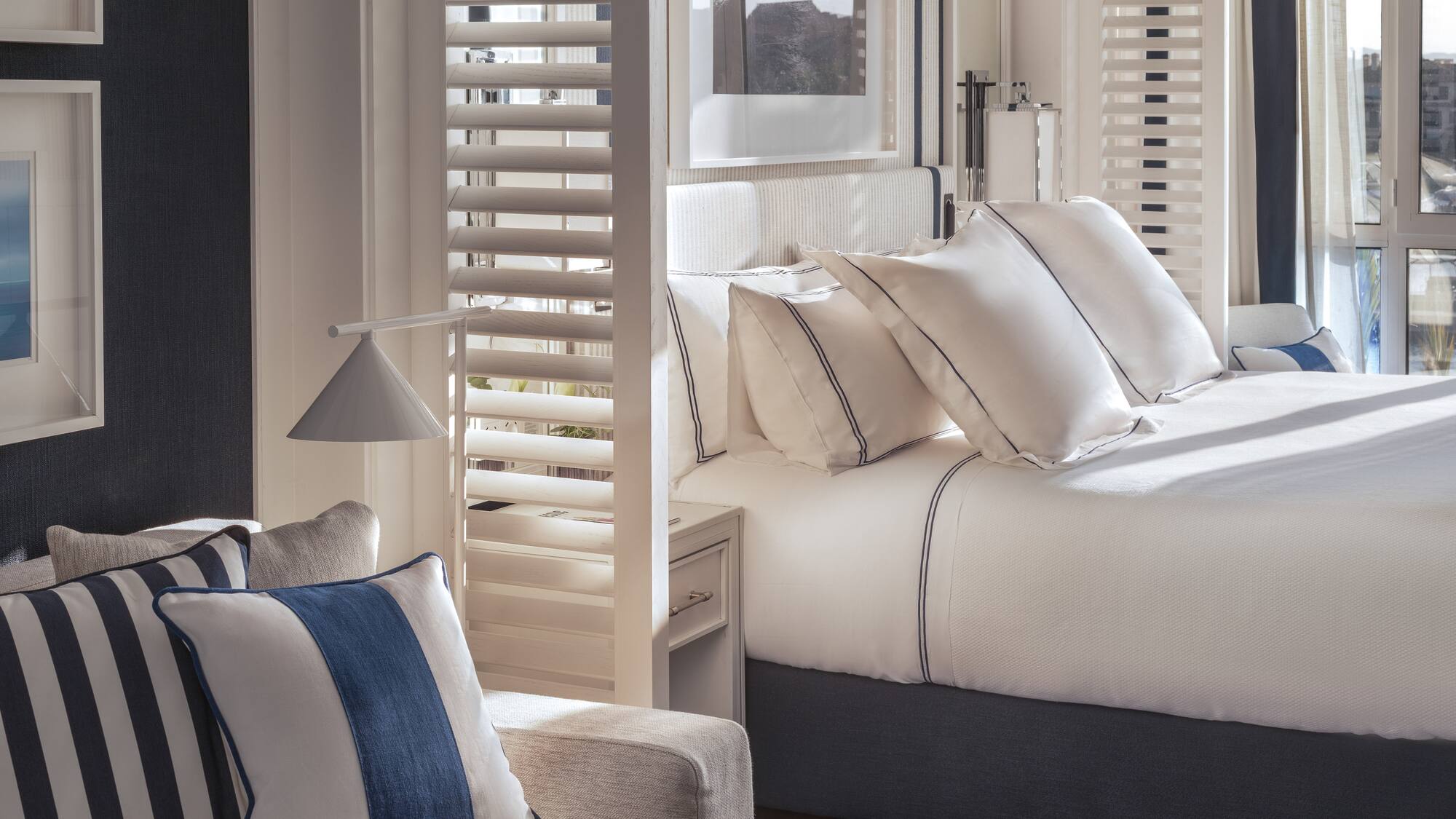 a room with a bed and a chair