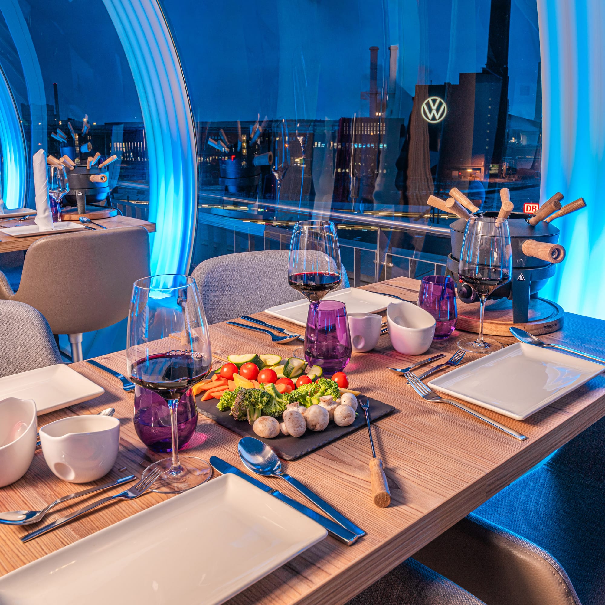 a table with plates and glasses on it