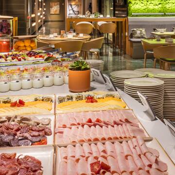 a buffet table with different food items
