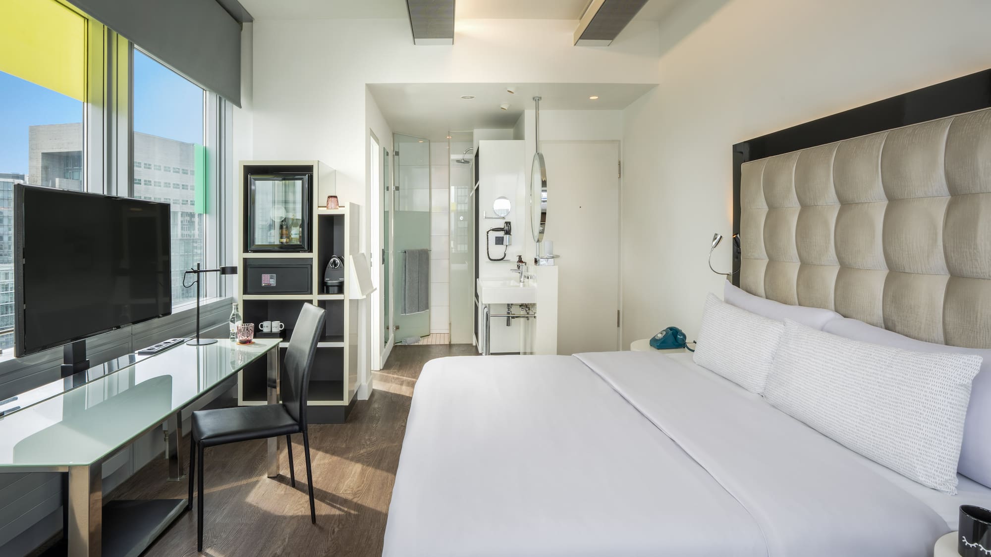 a room with a bed and a desk