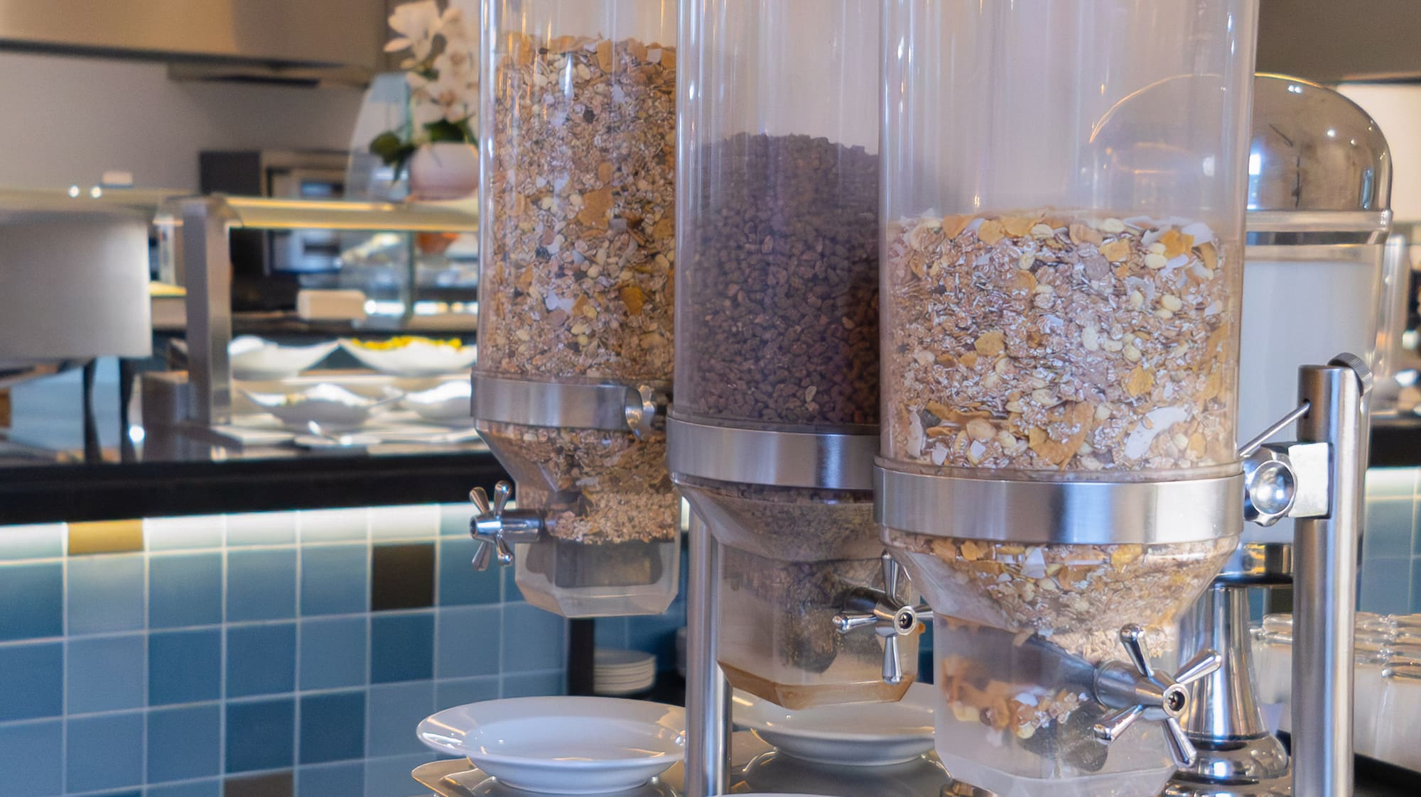 a group of cereals in containers on a table