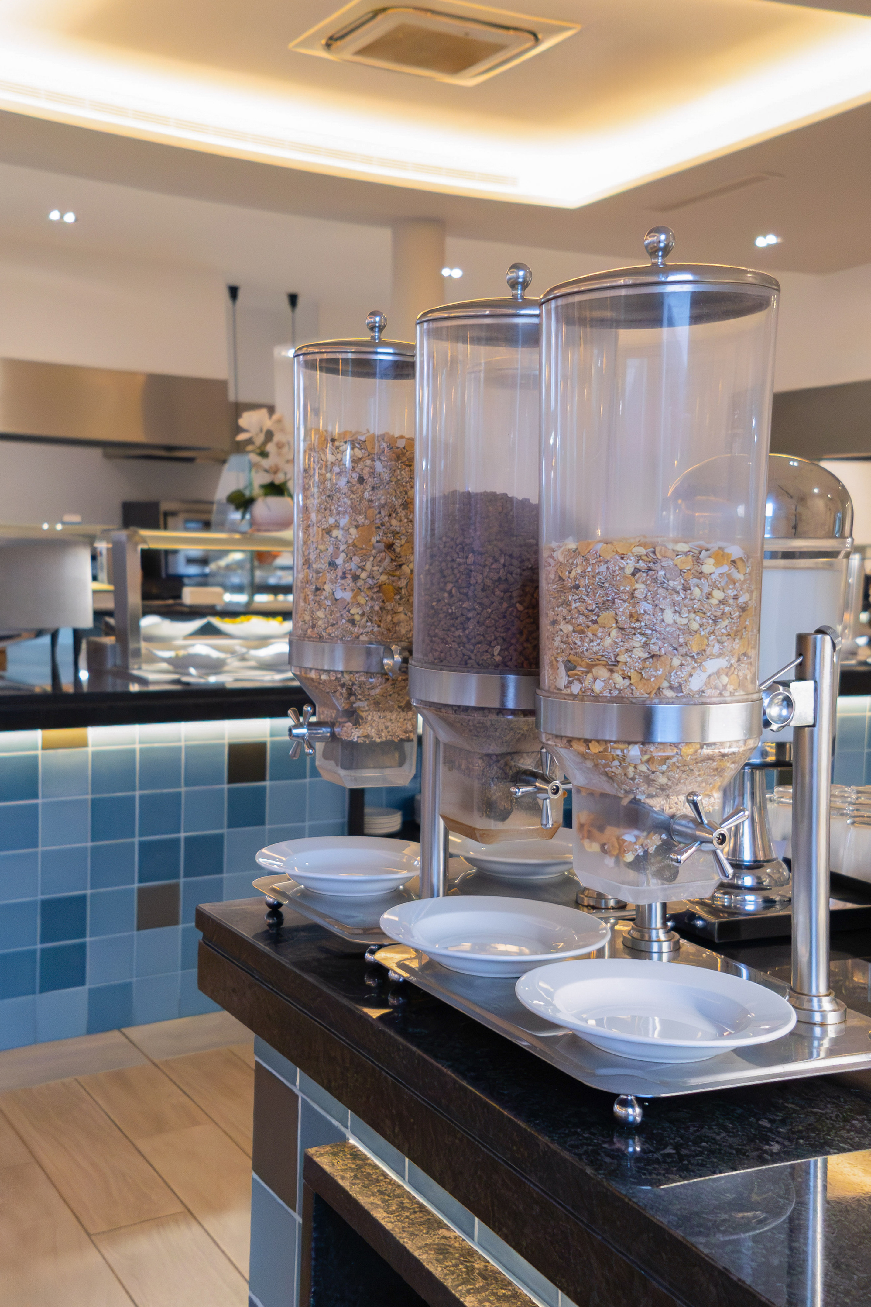a group of cereals in containers on a table