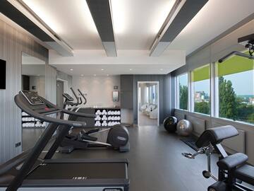 a room with treadmills and exercise equipment