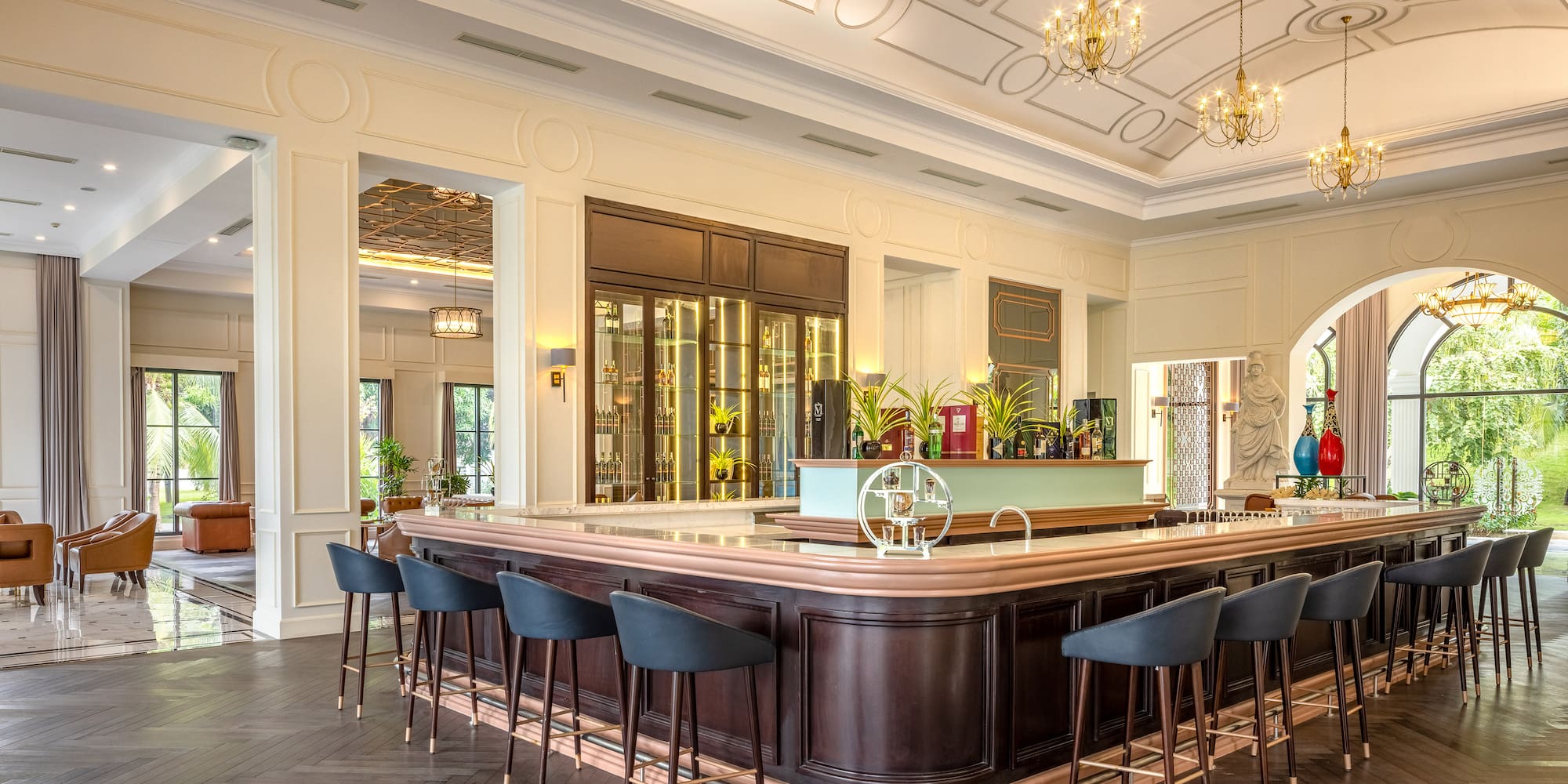a bar with chairs in a room