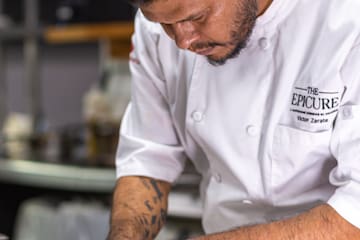 a man in a chef's uniform
