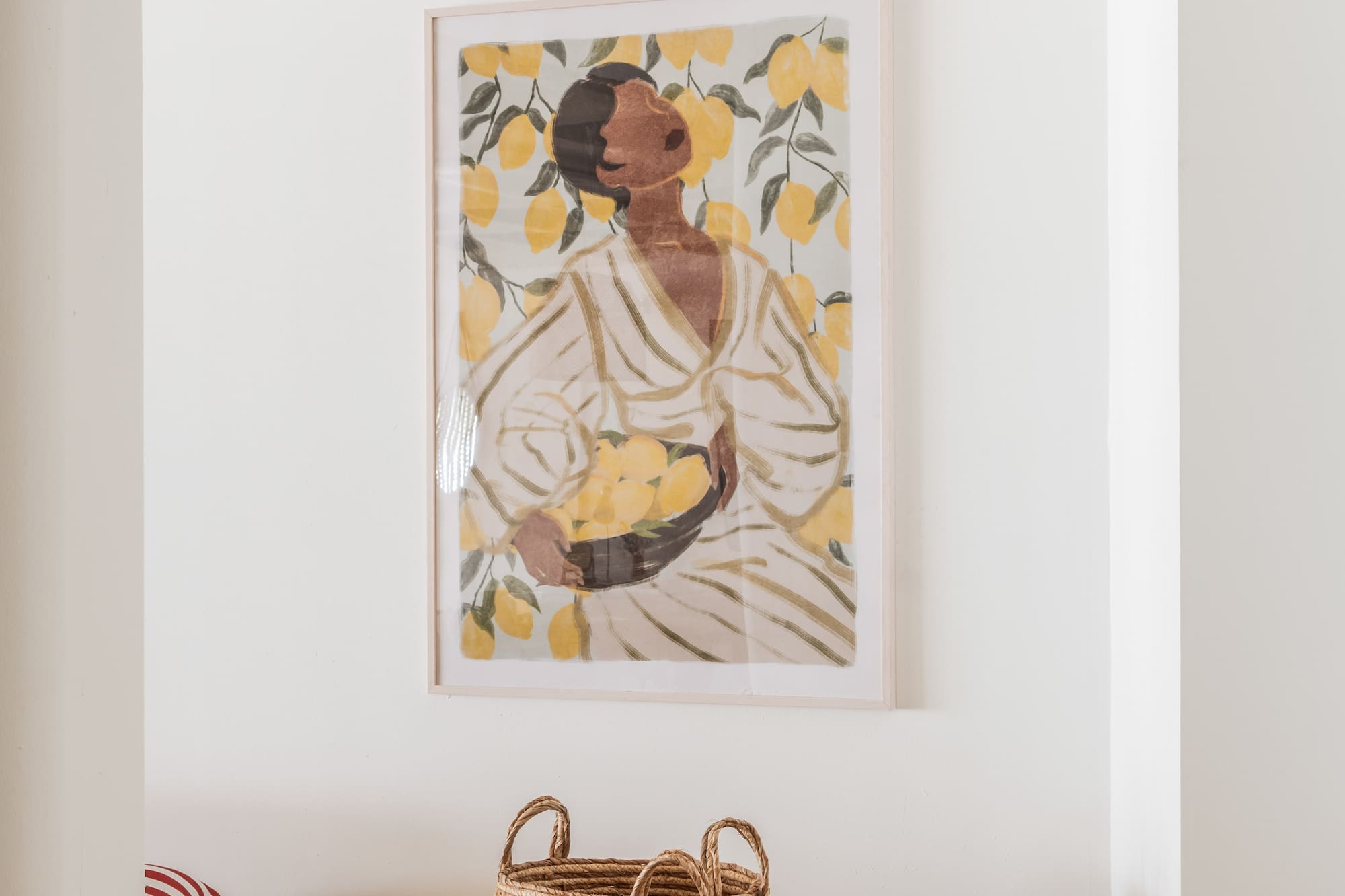 a painting of a woman and baskets on a wall