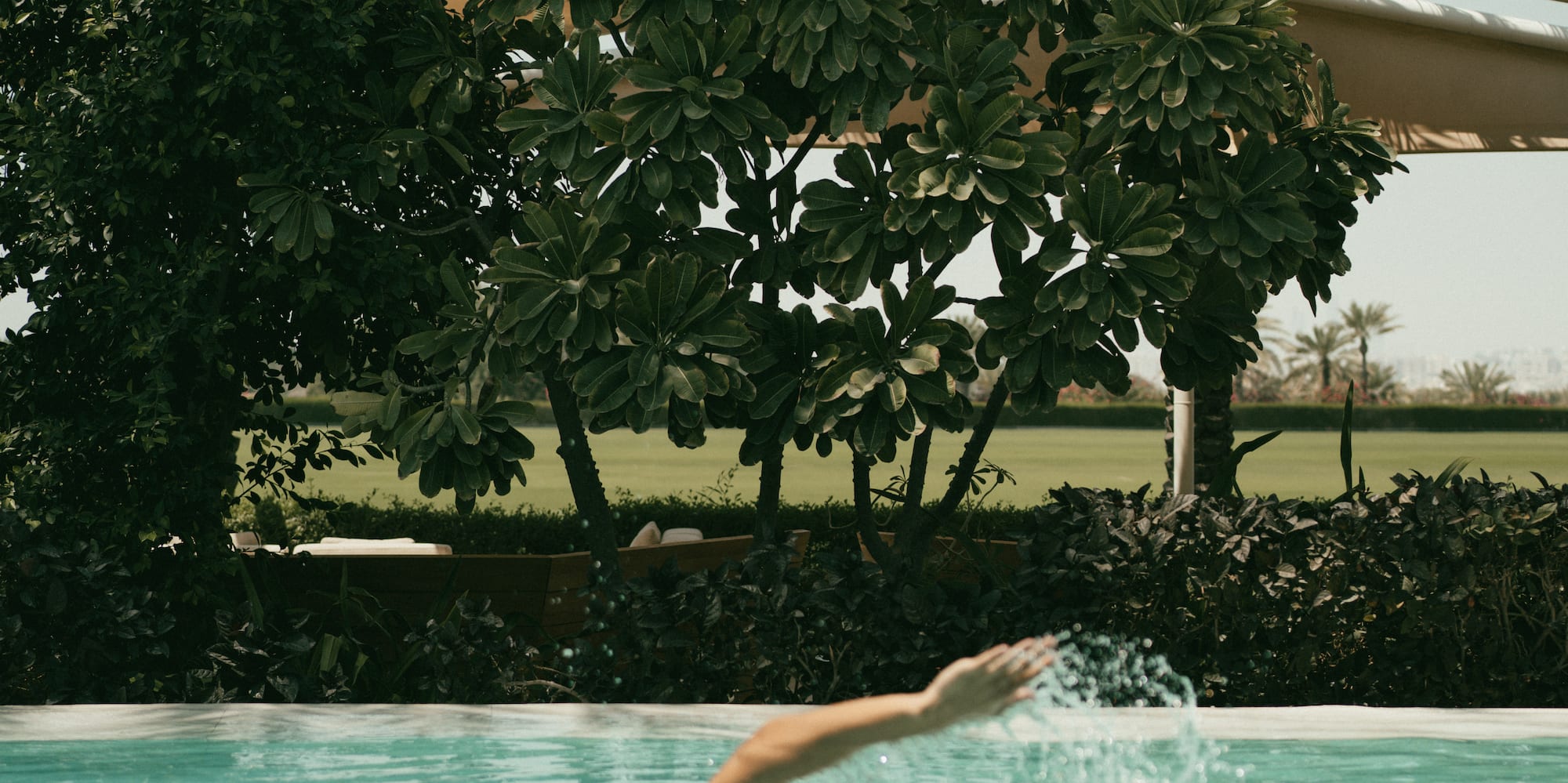 a person swimming in a pool