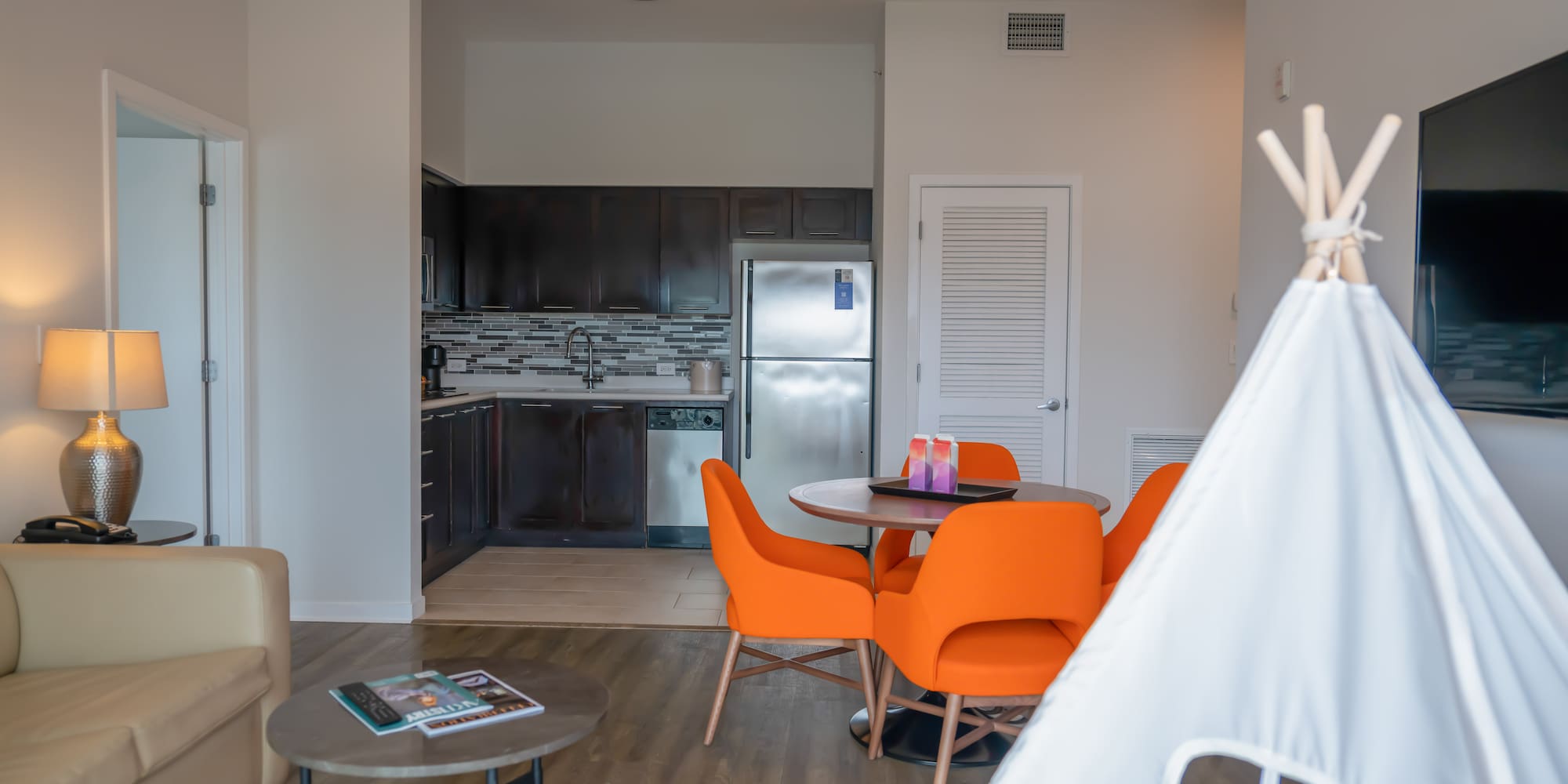 a room with a table and chairs