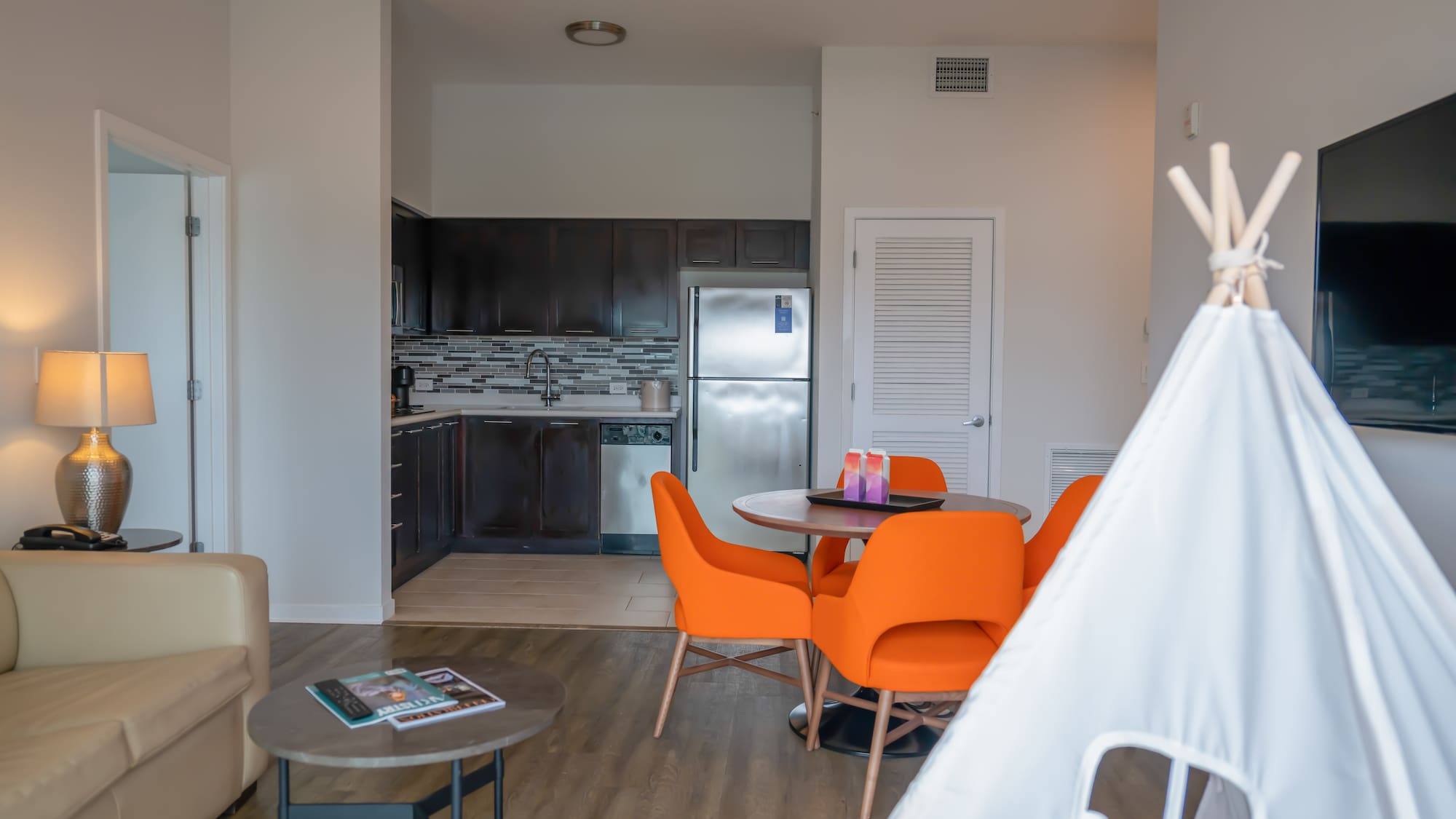 a room with a table and chairs