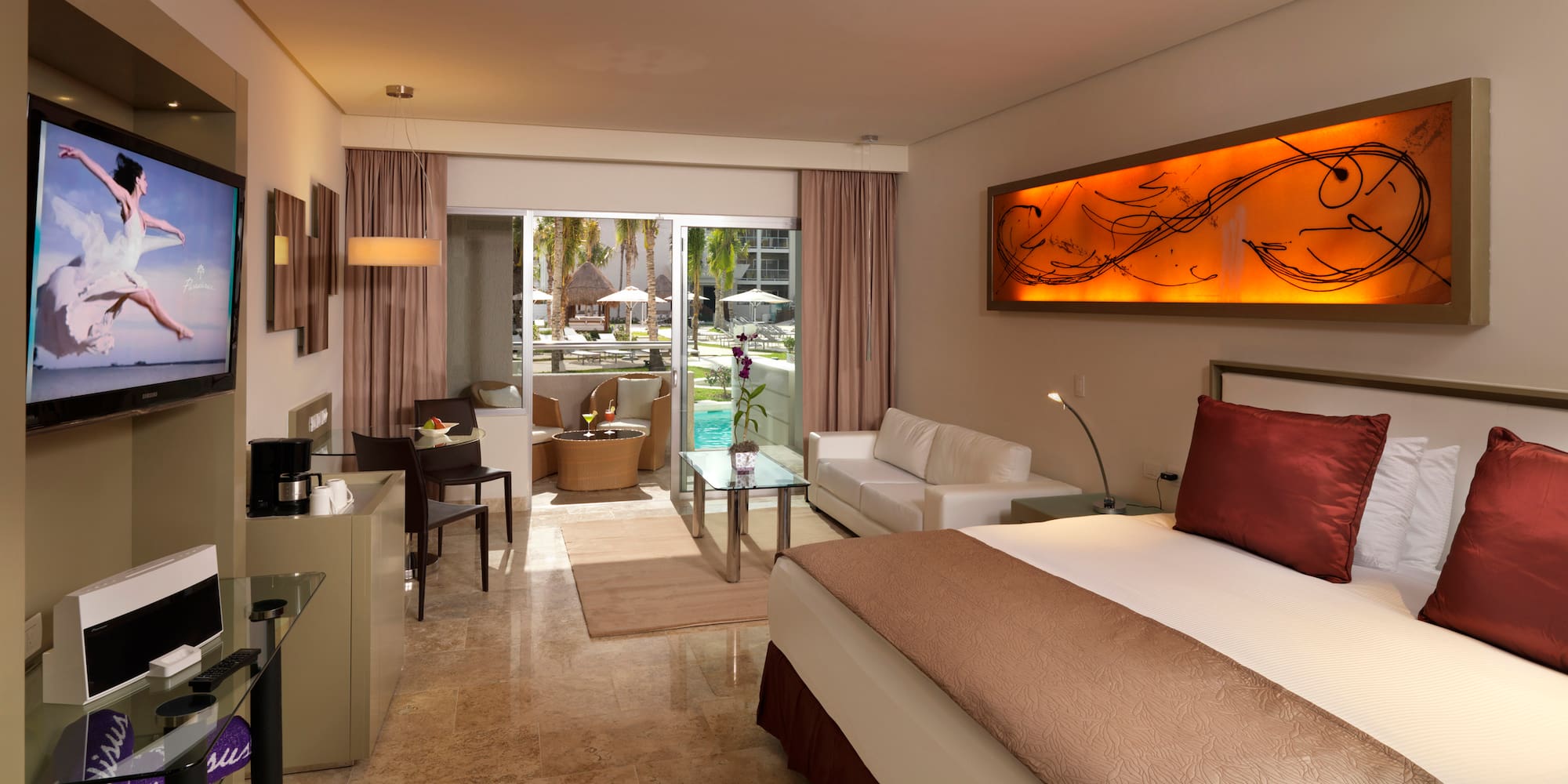 a room with a bed and a glass door