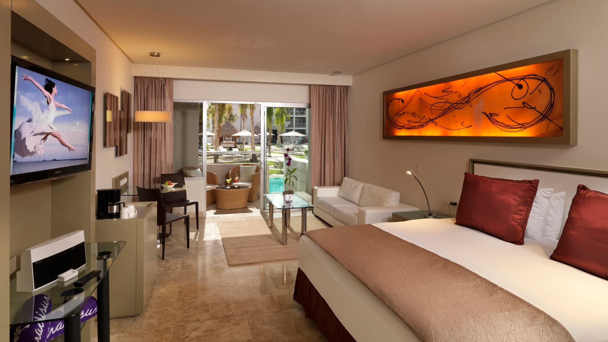 a room with a bed and a glass door