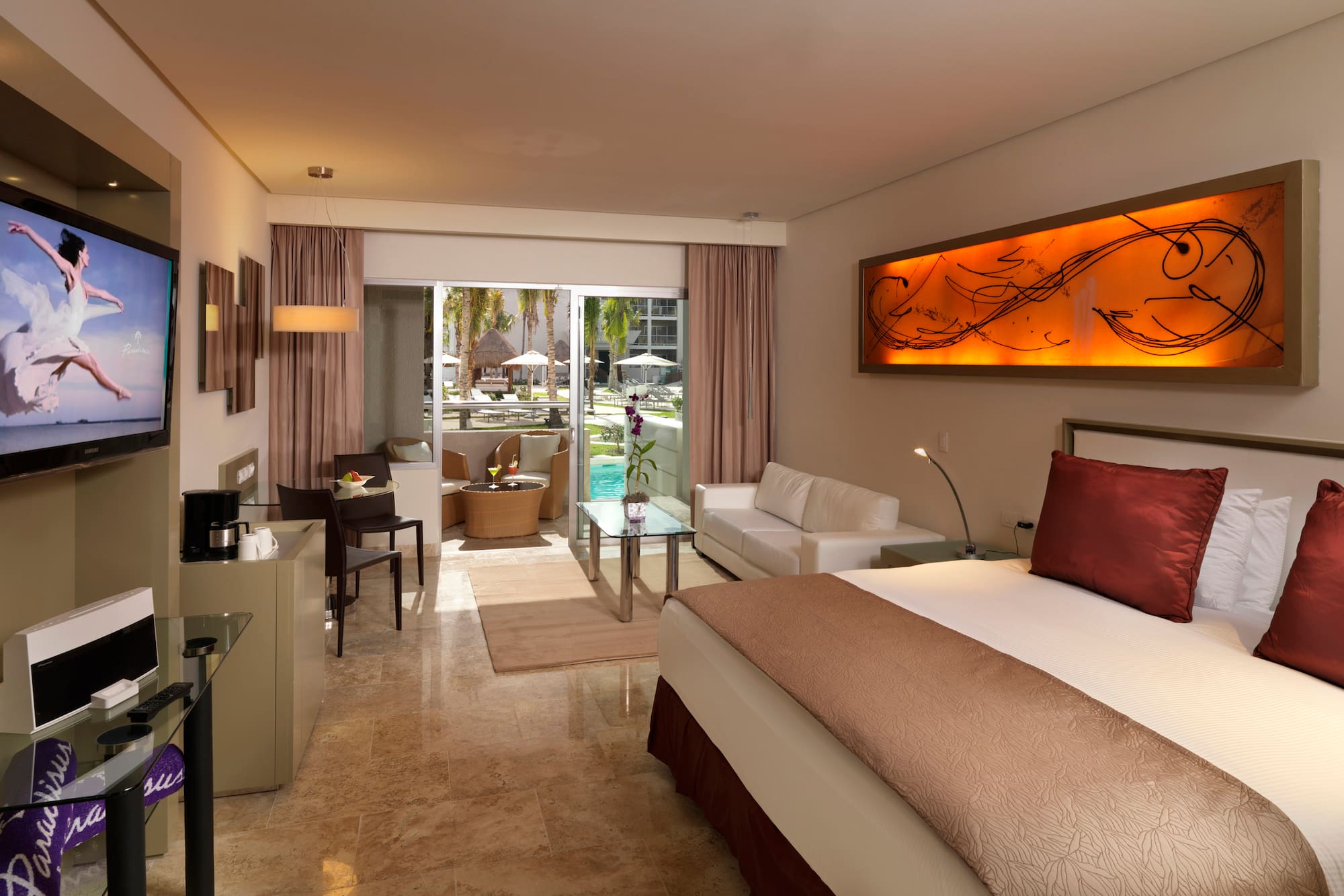 a room with a bed and a glass door