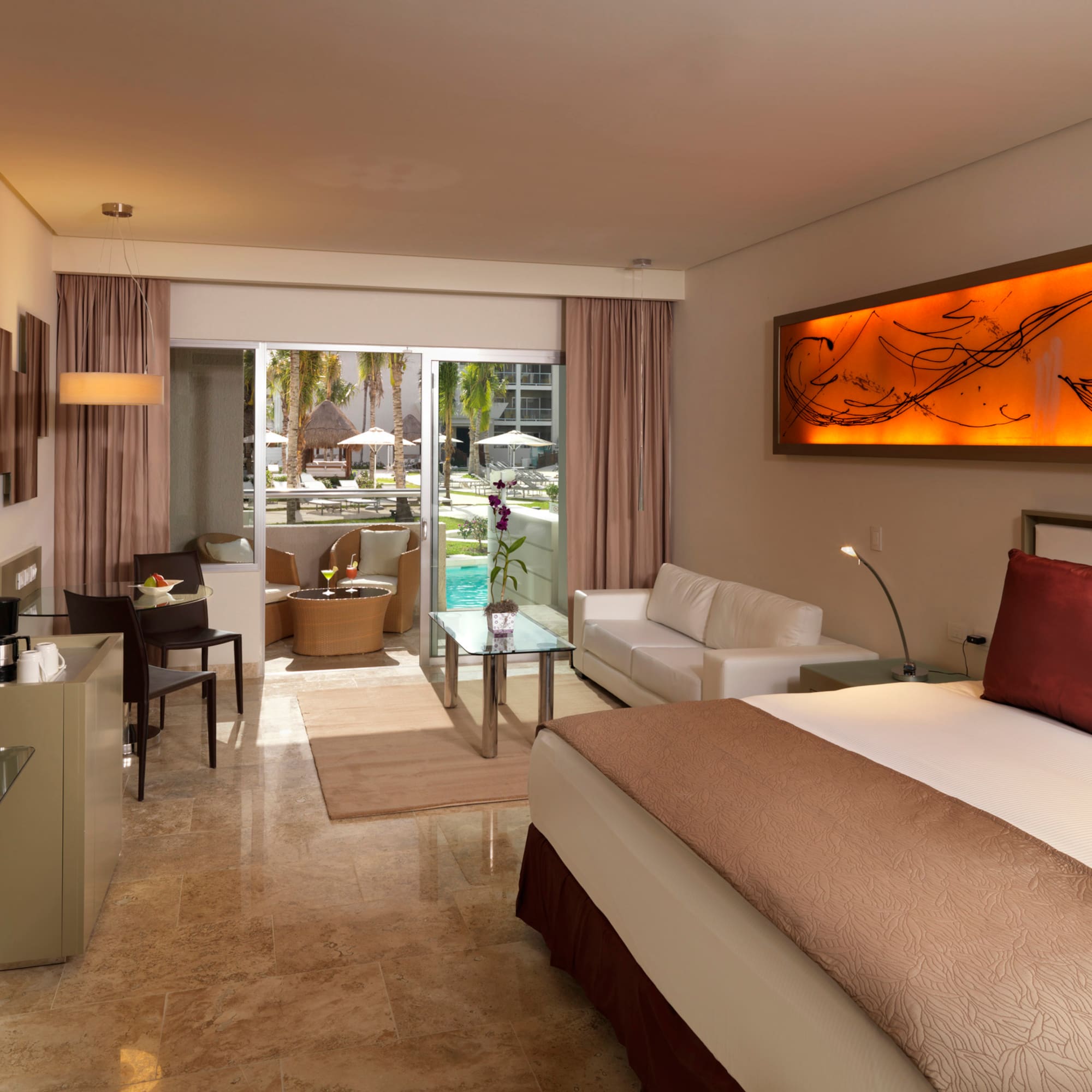 a room with a bed and a glass door