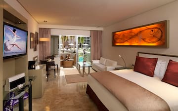 a room with a bed and a glass door