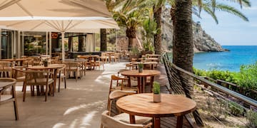 tables and chairs outside a restaurant