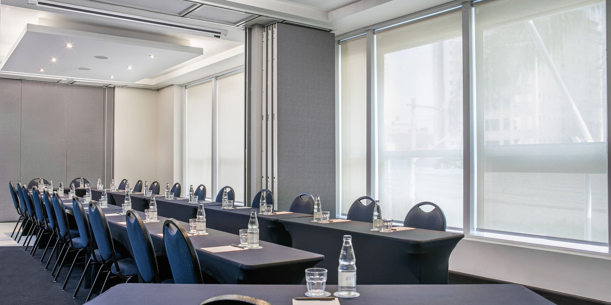 a room with tables and chairs