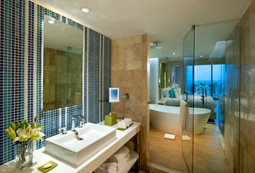 a bathroom with a tub and sink