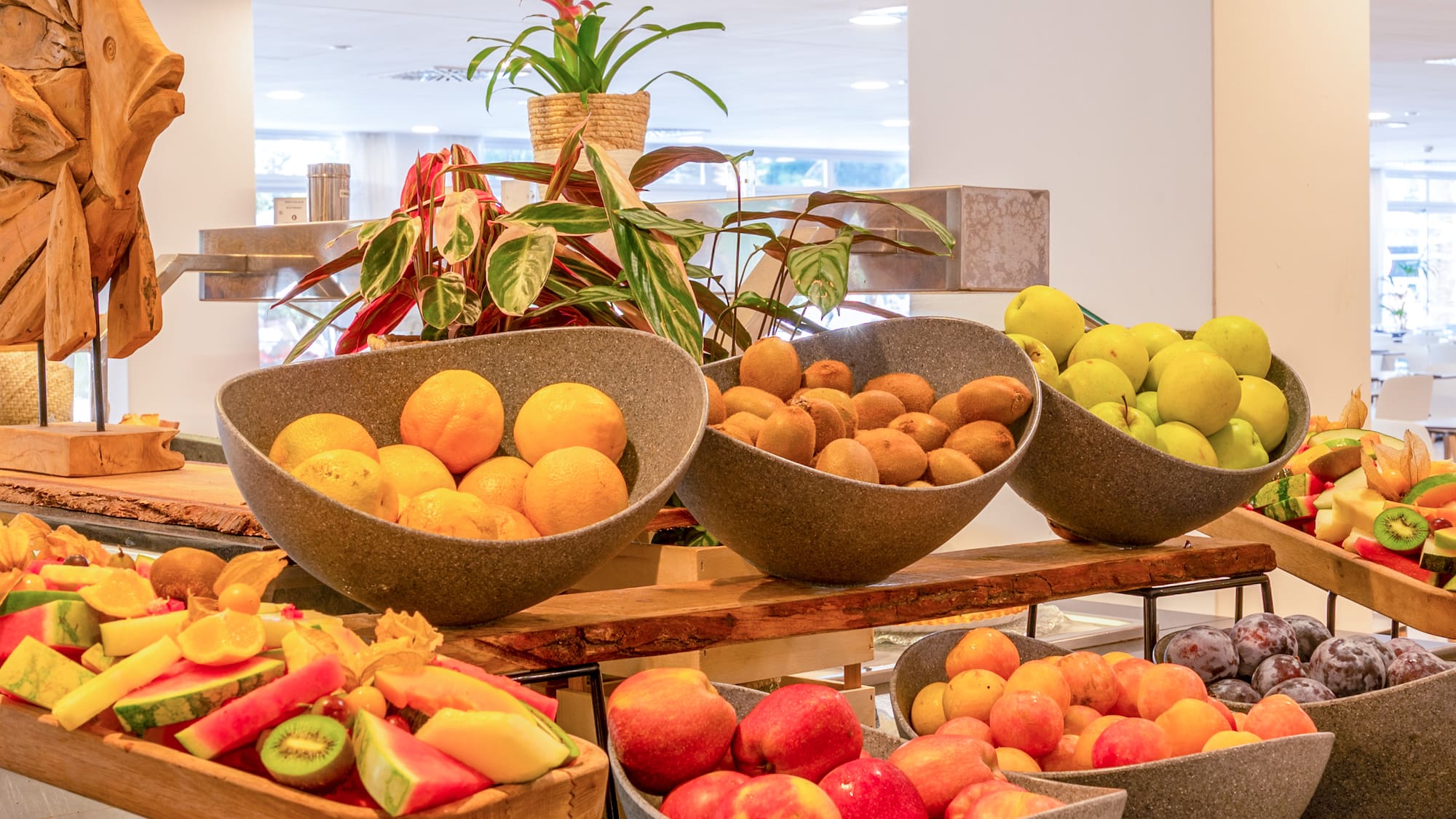 a group of bowls of fruit