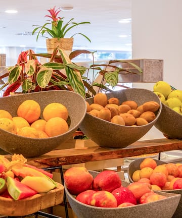 a group of bowls of fruit