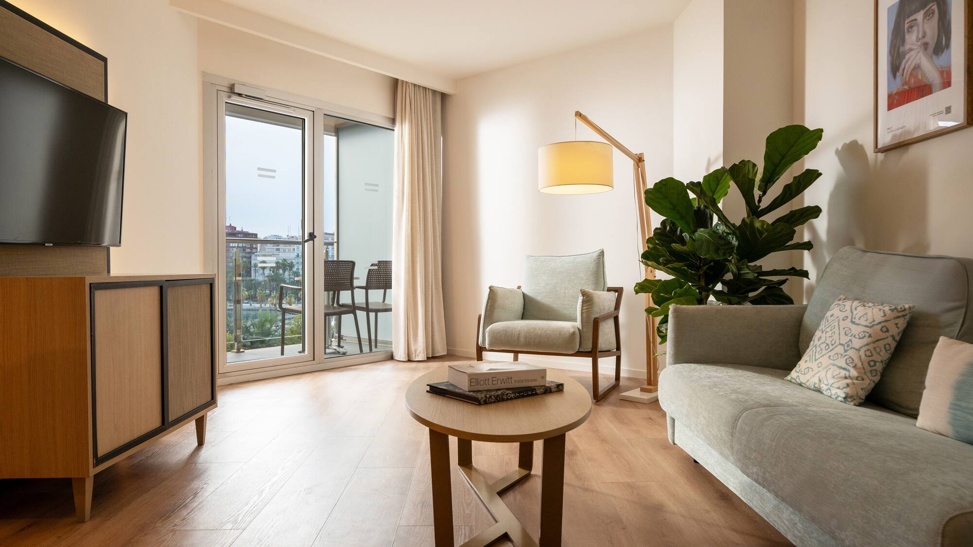 a living room with a couch and a table