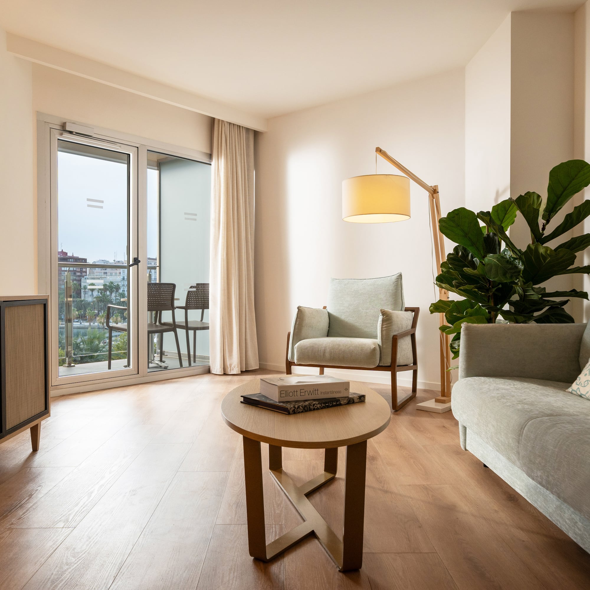 a living room with a couch and a table