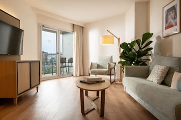 a living room with a couch and a table