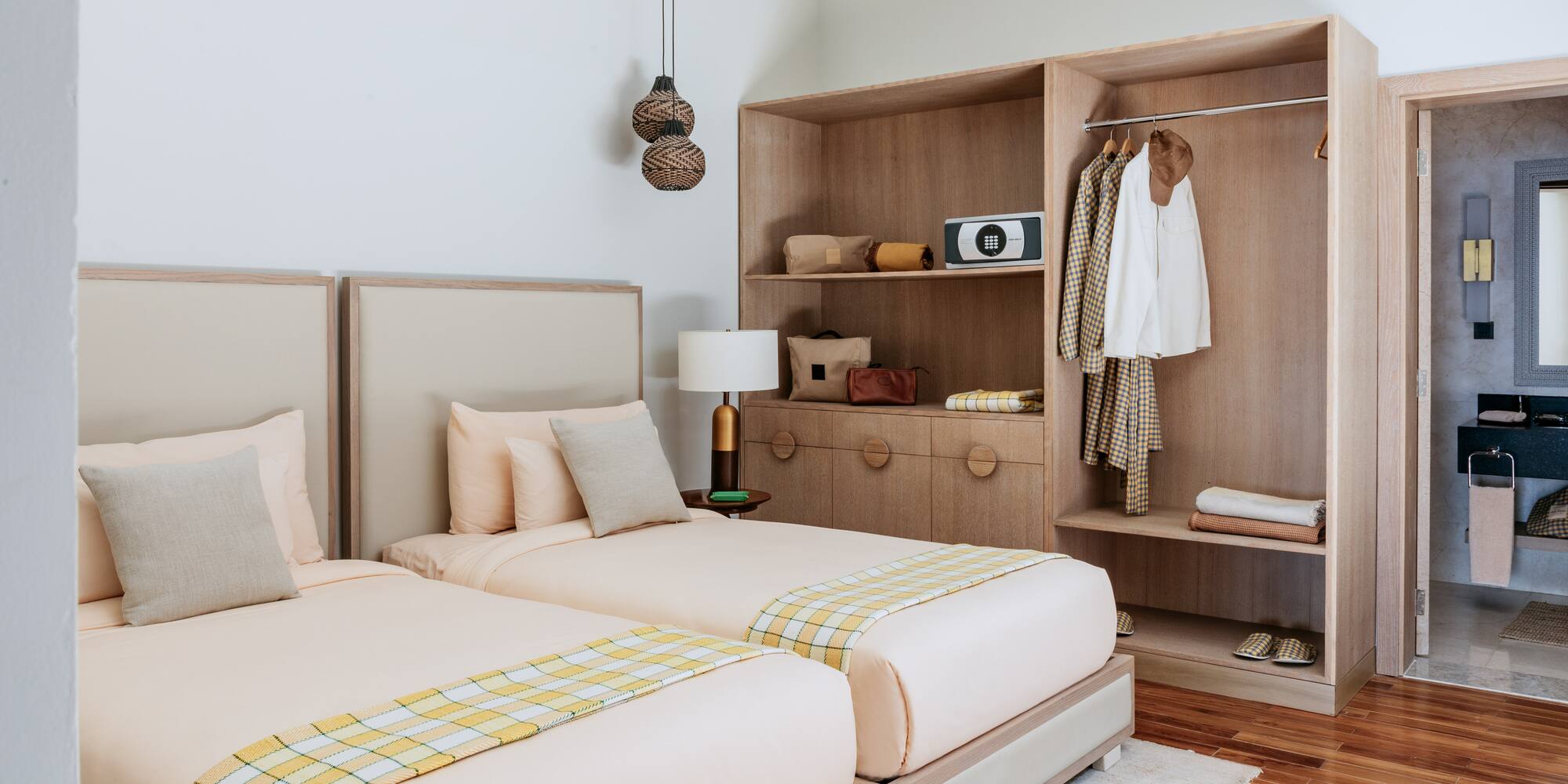 a room with two beds and a closet