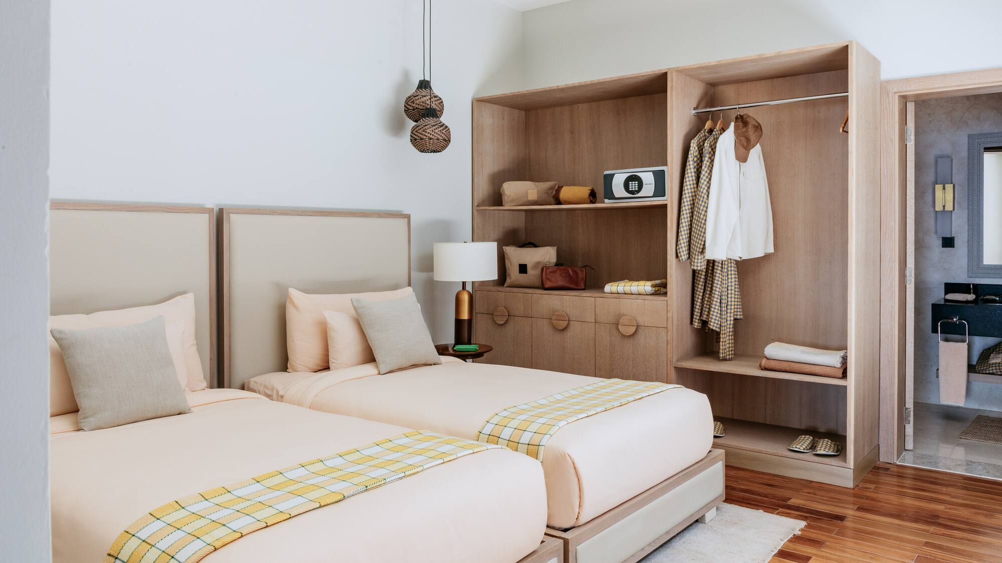 a room with two beds and a closet