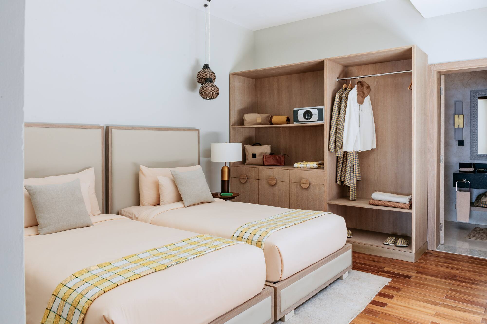 a room with two beds and a closet