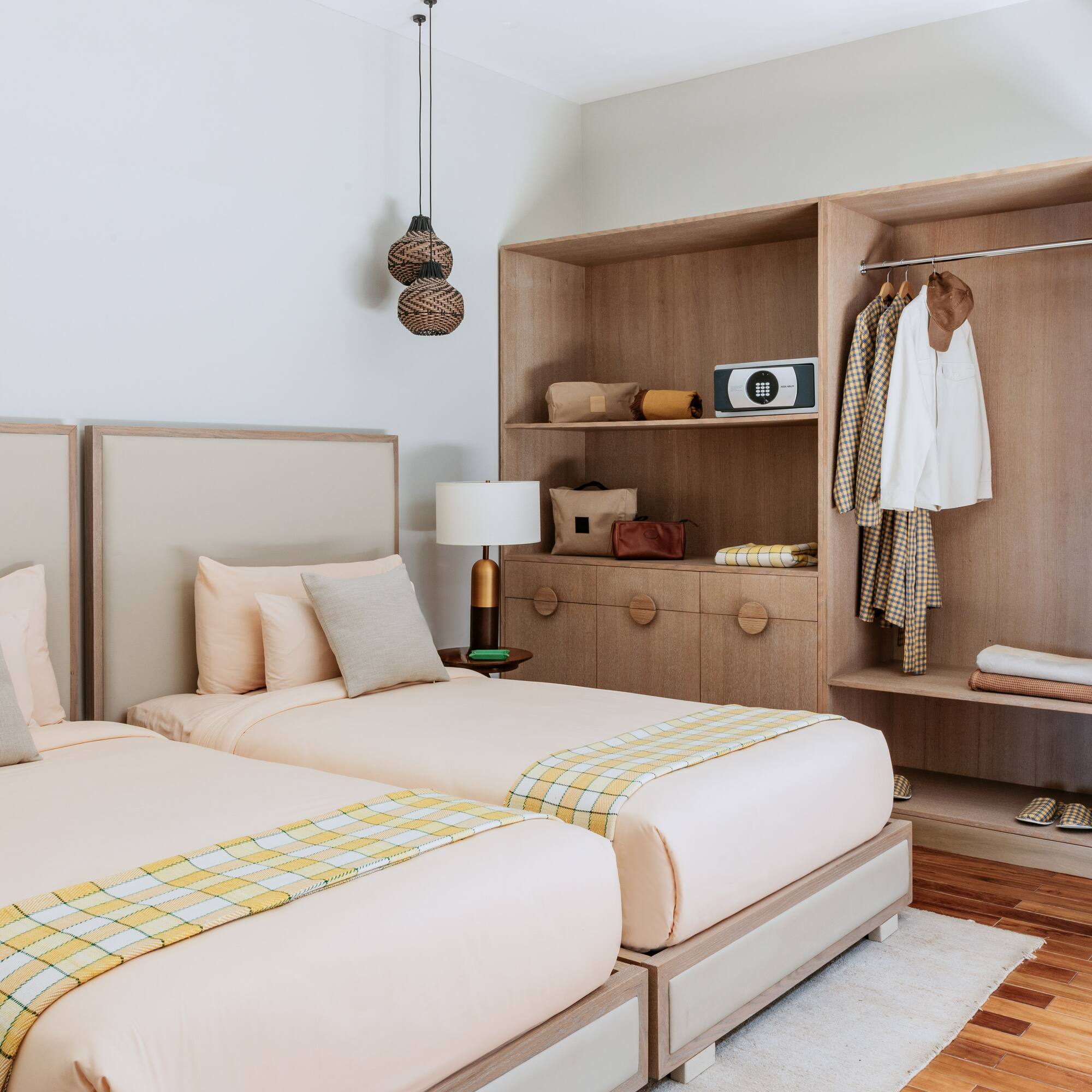 a room with two beds and a closet