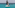 Catamaran with black Messi 10 sails on clear turquoise water.