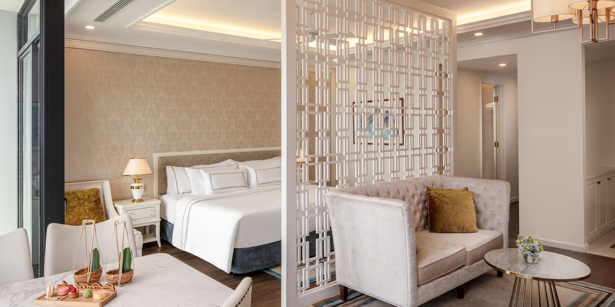 a room with a bed and a screen