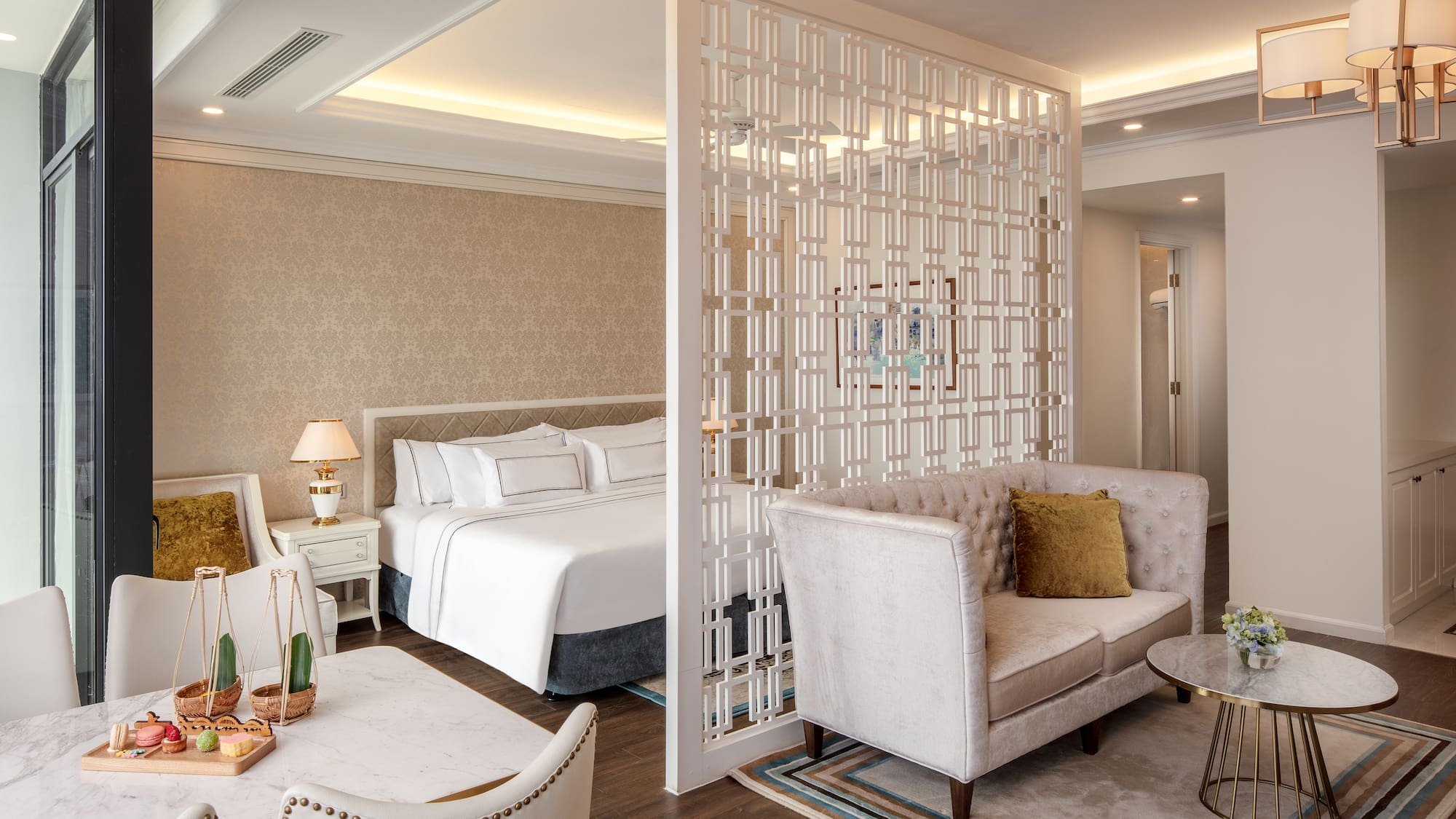 a room with a bed and a screen