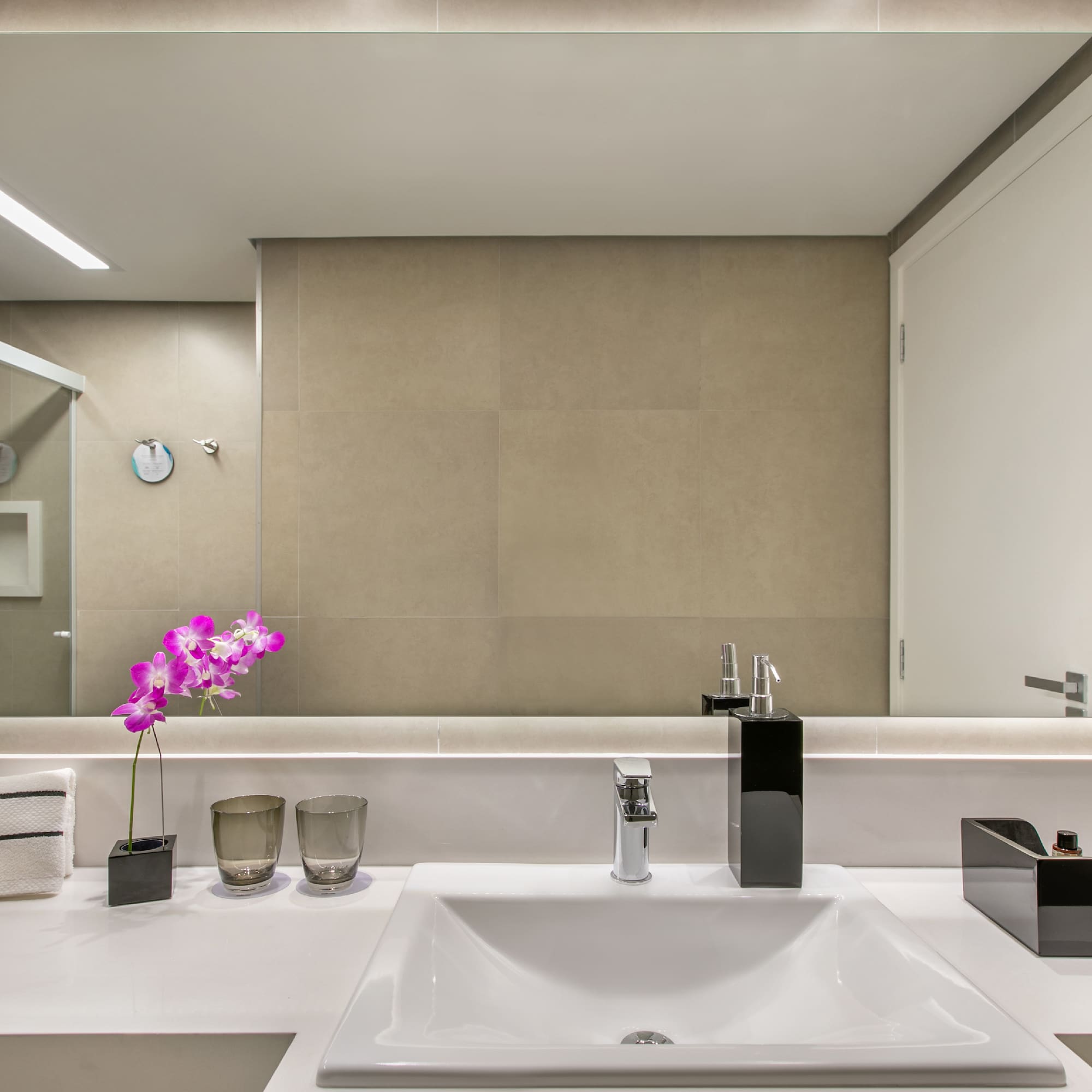 a bathroom with a sink and a mirror