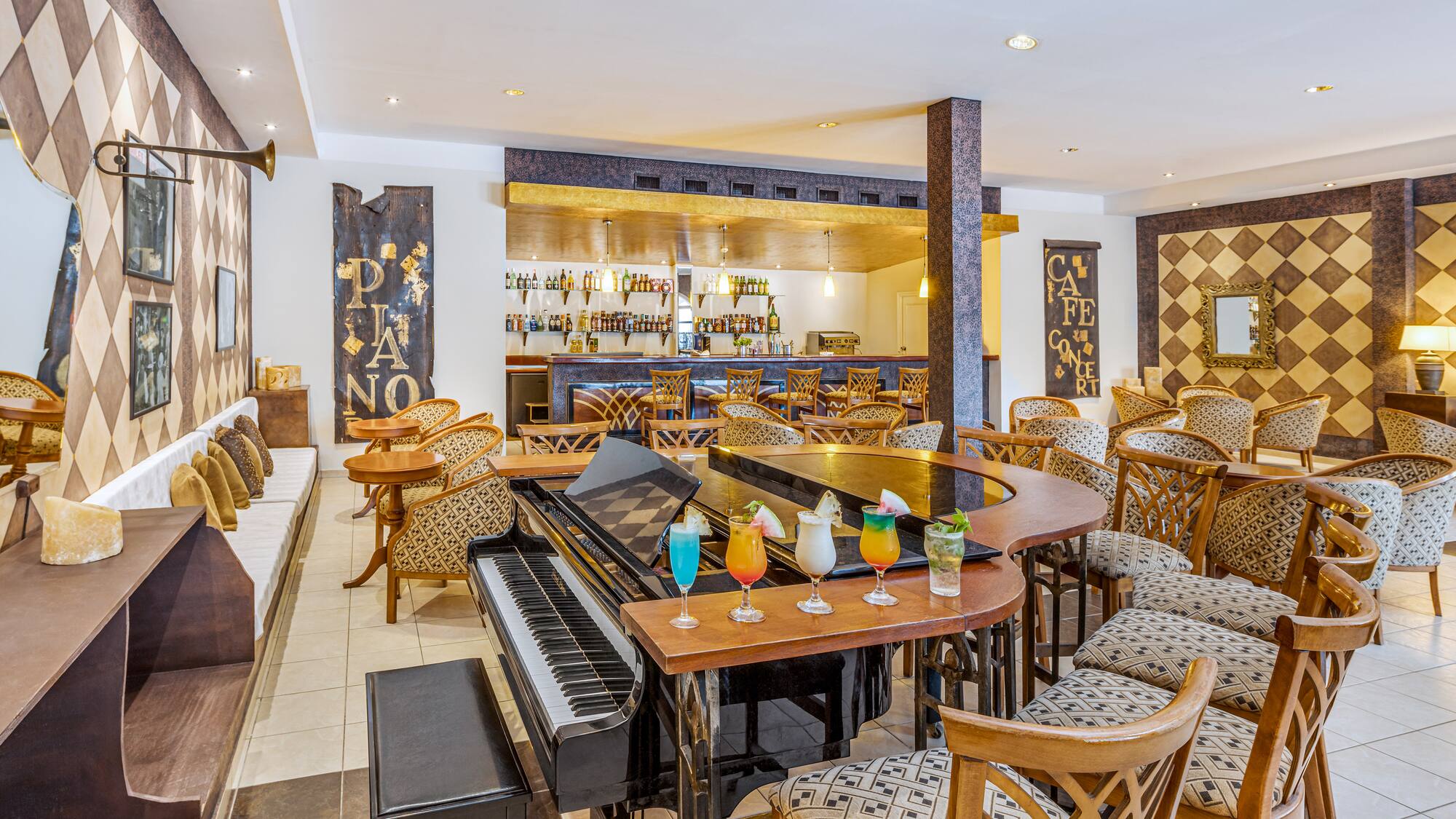 a bar with a piano and chairs