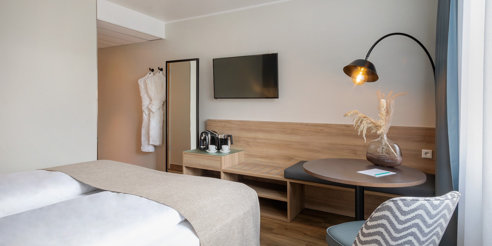 a room with a bed and a table