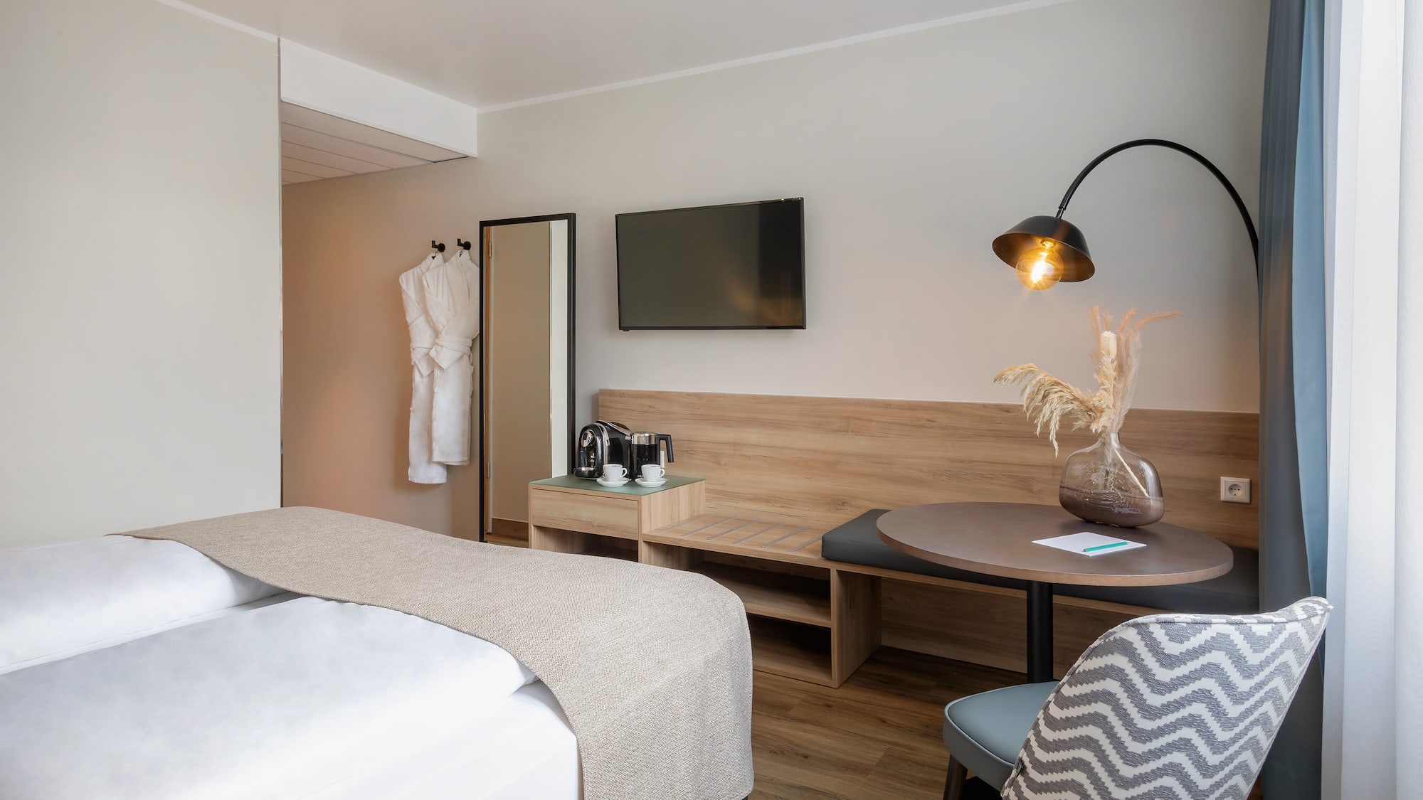 a room with a bed and a table