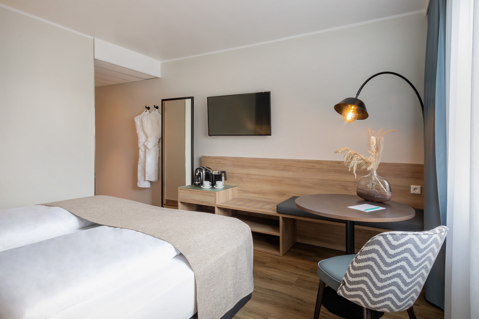 a room with a bed and a table