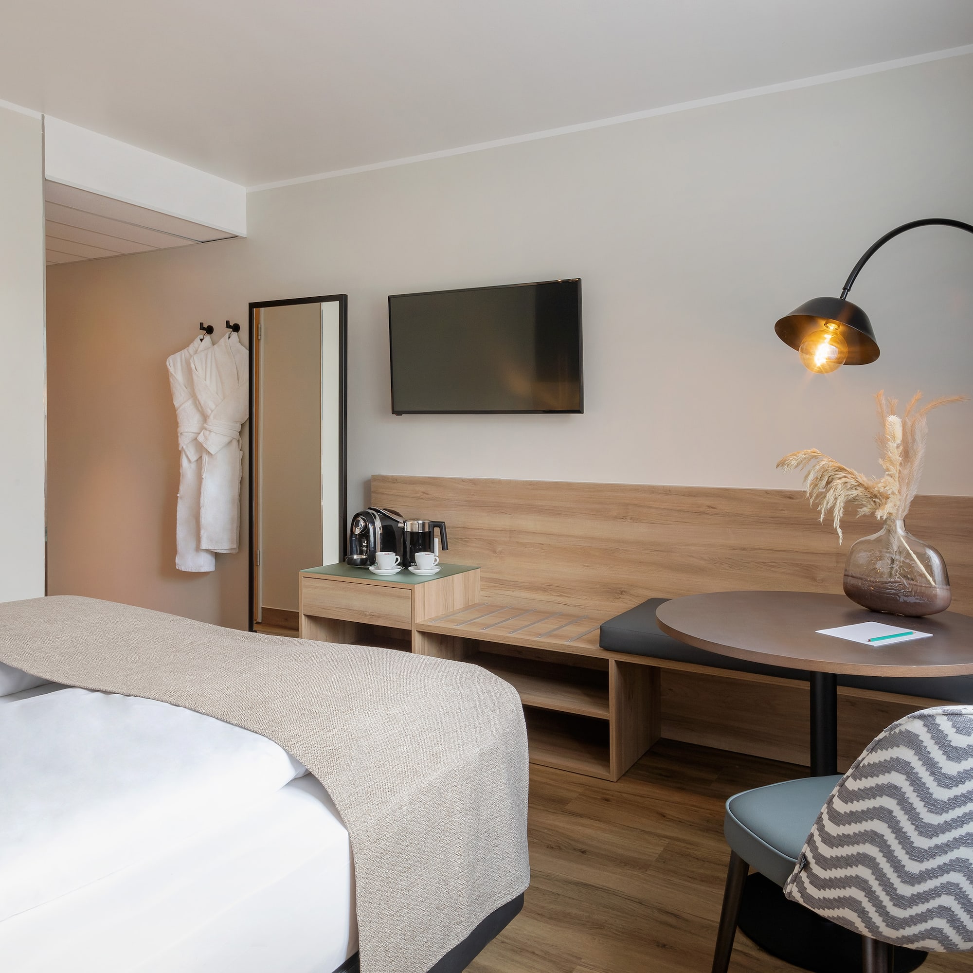 a room with a bed and a table