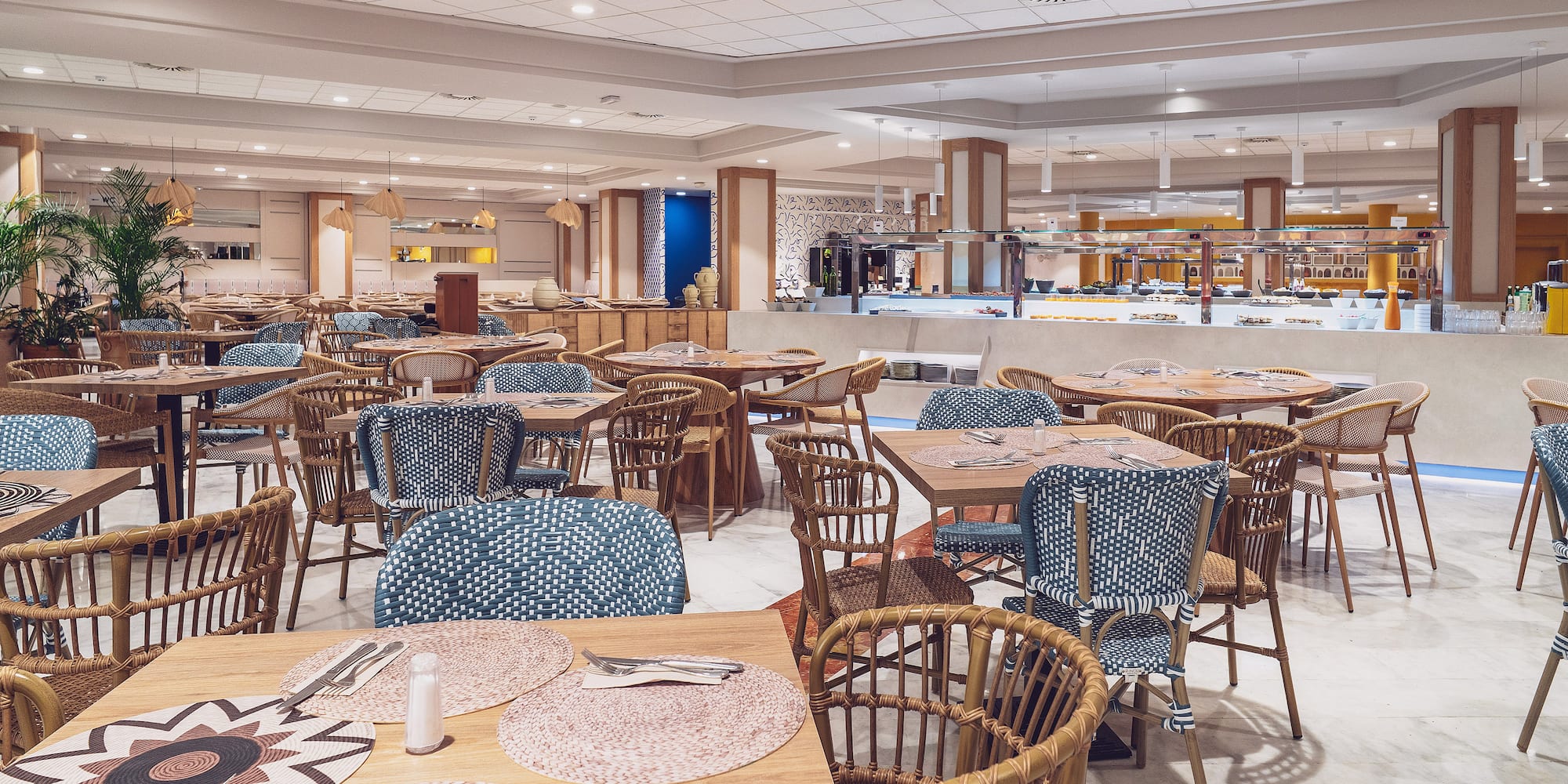 a restaurant with tables and chairs