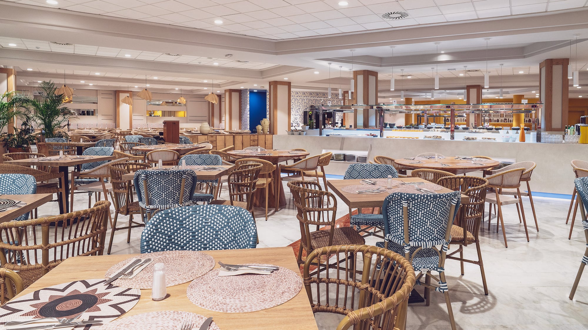 a restaurant with tables and chairs