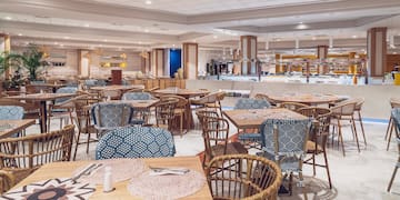 a restaurant with tables and chairs